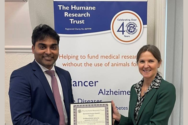 A picture of Dr Alison Giles presenting Dr Bhuvaneish Thangaraj Selvaraj with the Diamond Project Award which is a research grant from the Humane Research Trust.