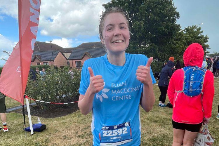Hannah Crick at the end of the Edinburgh Marathon Festival