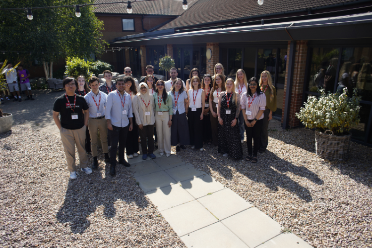 A group image of early-career researchers outside in the sunshine at the MND Association's EnCouRage workshop event 2026