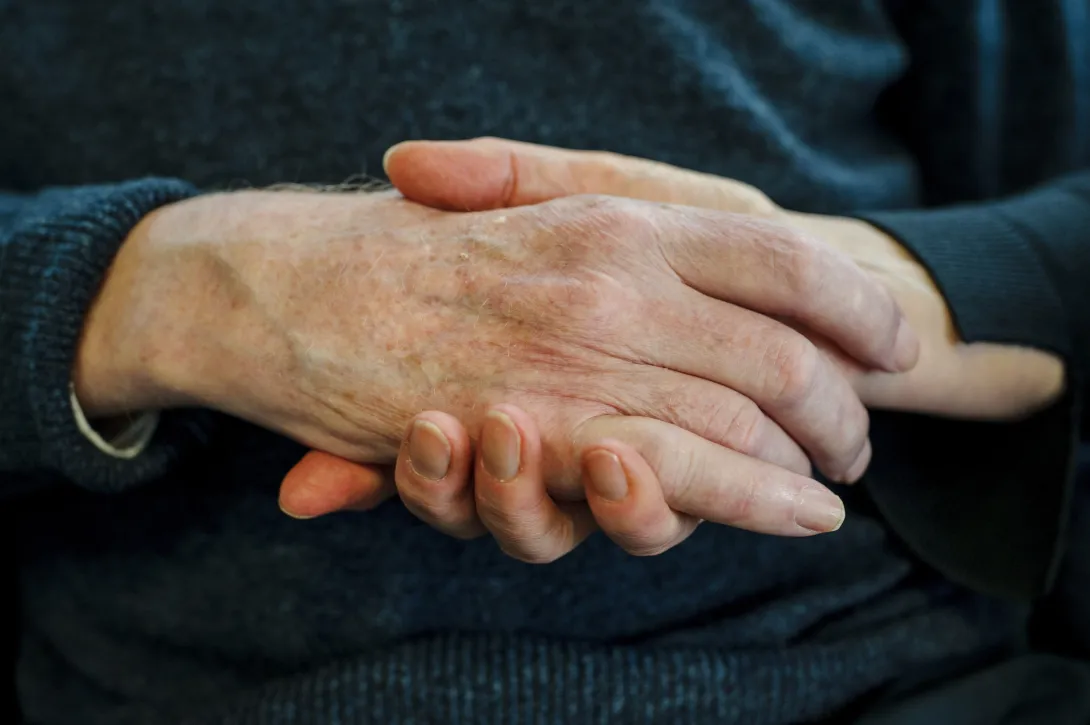 Caring and supportive hands holding together